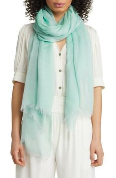 Cut from a silk-kissed fabric and framed with wispy fringe, this airy scarf floats over your look for an ethereal finish. 41" x 79"; 1/2" fringe 70% modal, 30% silk Dry clean Imported Chic Solid Scarves For Spring, Wispy Fringe, Silk Scarf, Scarf Wrap, Nordstrom, Silk, Green, Fabric, Clothes