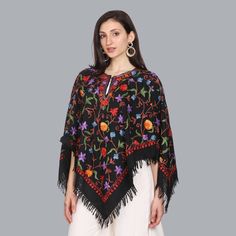 Stunning Kashmiri Embroidered Handcrafted Woolen Black Multi Color Poncho Free Size Original Product of Kashmir Bohemian Long Sleeve Embroidered Poncho, Black Shawl Cape For Festival, Embroidered Long Sleeve Poncho For Festival, Traditional Embroidered Winter Poncho, Traditional Embroidered Poncho For Winter, Winter Embroidered Long Sleeve Poncho, Traditional Black Cape For Fall, Winter Festival Embroidered Poncho, Traditional Black Shawl Outerwear