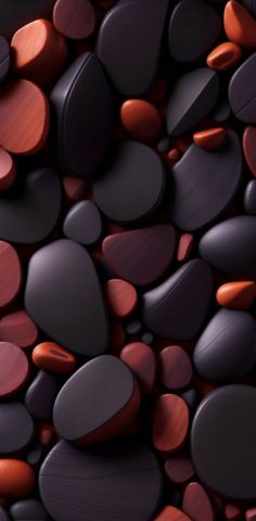 an image of rocks and pebbles that are red, purple, orange and black colors