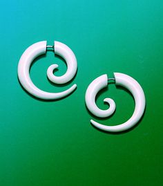 I'm not a big fan of gauges, but I like that i can show of my edgy side with these.  .  Tribal Fake Gauge Earrings  Small Bone Spirals by PrimalOriginals, $18.00 Bone Hand, Handmade Hoop Earrings, Bone Earrings, Horn Jewelry, Bone Jewelry, Plug Earrings