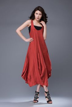 Super feminine and comfortable, this casual red linen dress is a must-have for any summer wardrobe. Wear it with chunky boho jewelry for a casual look and relaxed vibe. Youll create an entrance wherever you go with this incredibly versatile linen dress. Sleeveless, loose-fitting and flaunting a gorgeous tulip-shaped hemline, the dress is suitable for any shaped lady. This is a really versatile but unique designer dress.  You may also like this sleeveless gray linen dress here: https://www.et... Casual Red Linen Beach Dress, Red Linen Bohemian Dress, Red Linen Dress For Spring, Red Linen Summer Beach Dress, Red Bohemian Linen Dress, Solid Color Bohemian Linen Dress, Red Lagenlook Dress, Red Linen Summer Dress, Casual Red Linen Dress