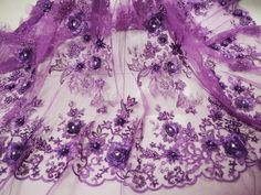 dark purple 3D flowers Beaded lace fabric, Bridal 3D Lace Applique lace fabric for costume dress sewing accessories All products are high quality and beautiful colors, you will like it if you try it. The flowers and beads are made on the fabric by handwork, takes much time to produce this 3D fabric. You can use it as whole fabric or cut it into appliques to make it suitable for your different project. At present we have champagne gold, mint green and purple color in stock. If you like to custome Purple Lace Tulle Fabric For Wedding, Elegant Purple Lace Tulle Fabric, Purple Lace Tulle Fabric For Party, Champagne Gold Color, Applique Lace, 3d Fabric, Beaded Lace Fabric, Embroidered Lace Fabric, Wedding Costumes