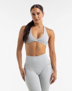 The Freedom Sportsbra combines everything you need in the support of a sports bra into a crop top design. The Freedom Sportsbra is incredibly soft, breathable and perfected in both fit and design - Double lined with no padding - Support is light to moderate - Supportive straps with a crossback design - Fabric is incredibly soft and breathable 80% Polyester, 20% Spandex Bella is wearing a Small, is 5'4" Sports Crop Top With Built-in Bra And 4-way Stretch, High Stretch Crop Top With Built-in Padding For Workout, Cropped Yoga Sports Bra With Built-in Bra, Gray Activewear With Built-in Bra For Sports, Cropped Sports Bra With Built-in Bra For Training, Sporty High Stretch Crop Top With Built-in Padding, Athleisure Crop Top With Built-in Bra For Light Sports, Compressive Crop Top With Built-in Padding For Workout, Light Support Crop Top For Gym