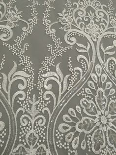 "This stunning Lace Fabric design piece has soft hand feel, It's perfect for weddings, bridal parties, and any events. Shop our large inventory of bridal fabrics. ☆PRODUCT DESCRIPTION : This gorgeous fabric is made on a sheer base with a beautiful vintage embroidery throughout. The fabric width is approximately 51\" (130cm) Wide. Color: off-white or beige as in picture Material: Rayon, Polyester，Sequins ☆ PURCHASING INFORMATION: This fabric is sold by the yard and each Qty you enter will represe Elegant Machine Embroidered Fabric For Wedding, Cream Embroidered Sequin Fabric For Wedding, White Embroidered Sequin Fabric For Reception, Cream Wedding Embroidered Fabric, Traditional Machine Embroidered Fabric For Wedding, Embroidered White Wedding Dress For Reception, White Embroidered Wedding Dress For Reception, Cream Sequin Fabric With Intricate Embroidery For Wedding, White Sequin Fabric With Intricate Embroidery For Festive