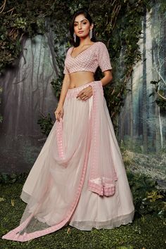 Pink organza lehenga with crystals and tikki hand embroidery. Comes with a blouse and a dupatta.
Components: 3
Pattern: Hand embroidered
Type Of Work: Crystals, Tikki
Neckline: V Neck
Sleeve Type: Half
Fabric: Organza, Dupatta : Net
Color: Pink
Other Details: 
Embroidered borders on dupatta
Occasion: Wedding - Aza Fashions Designer Choli With Sheer Dupatta, Designer Net Lehenga For Navratri, Semi-stitched Organza Lehenga In Traditional Drape, Reception Choli With Sheer Dupatta In Georgette, Georgette Choli With Sheer Dupatta For Reception, Reception Georgette Choli With Sheer Dupatta, Semi-stitched Anarkali Organza Choli, Diwali Embellished Net Lehenga, Embellished Net Lehenga For Diwali