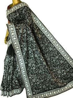 The new and latest style as your party drapes are woven in a unique manner with an amazing gachi tussar saree in vibrant black color with mavhine embroidery work on the body and the border comes with Kashmiri stitch done by adorably. Color: A shade of black color Technique: Work of machine embroidery on the whole body with Kashmiri stitch work on the border Fabric: Tussar Quality: IndyVogue's Assurance of Silk Mark Certification Tussar Saree, Border Fabric, Stitch Work, On The Border, Color Techniques, Kinds Of Fabric, Latest Sarees, Designer Blouse, Whole Body