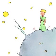 a little boy standing on top of a hill looking at the stars in the sky