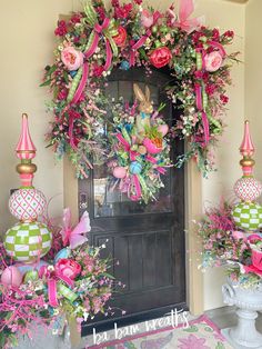 a door decorated with pink and green flowers