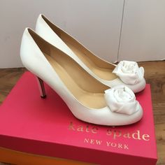 Kate Spade Karmen Wedding Evening White Satin Flower Pumps Condition: New Without Box Note:Size Runs Smaller, Please Choose The Half Size Bigger Than General. 100% Fabric Leather Sole Heel Measures Approximately 3.5" Accepting Offers Everything I Sell Is 100% Authentic No Trades Classic Fitted White Wedding Shoes, Classic White Bridal Accessories For Formal Occasion, Spring Wedding Shoes With Flower Design, Fitted Wedding Shoes For Bridal Shower With Round Toe, White Formal Wedding Shoes With Flower Design, White Fitted Wedding Shoes For Bride, Elegant Flower Heels For Wedding, White Bridal Accessories For Spring Formal, Spring Formal White Bridal Accessories