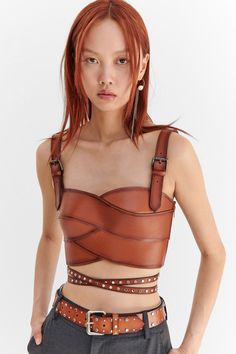 Monse Resort 2024 Collection | Vogue Resort 2024 Collection, Floral Evening Dresses, Resort 2024, Leather Bustier, Leather Mini Dress, Pleated Mini Skirt, 2024 Collection, Leather Top, New York Fashion