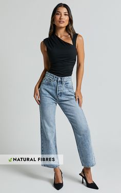 Get ready to rock the denim game in our Wilkins Jeans! With their high-waisted design, straight leg fit, and cropped hem, these jeans are the perfect blend of trendy and timeless. Made from a soft cotton blend with just the right amount of stretch, they offer ultimate comfort without compromising on style. The mid-blue wash adds a cool casual vibe that's perfect for any occasion. Whether you dress them up or down, these jeans will effortlessly take you from day to night in true fashion-forward s Jeans And Bodysuit Outfits, Jeans And Bodysuit, Body Suit Outfits, Hem Jeans, Denim Fabric, High Jeans, Jean Outfits, Wide Leg Jeans, Jeans Style