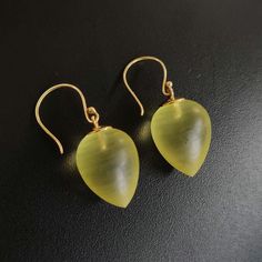 These stunning earrings are set in 14K Solid Yellow Gold with Natural Yellow Quartz with utmost precision. It is an unique gemstone earring pair for nearly every occasion and is completely hassle-free jewelry. 🔷 ABOUT GEMSTONE: Yellow Quartz is a radiant gemstone, celebrated for its bright, sunny yellow hue that symbolizes joy, optimism, and abundance. Known for its uplifting energy, Yellow Quartz is believed to inspire creativity, clarity of thought, and a positive outlook on life, making it a Polished Drop Earrings For Gift, Polished Finish Drop Earrings For Gift, Handmade Briolette Yellow Gold Earrings, Handmade Yellow Gold Briolette Earrings, Luxury Earrings With Ear Wire For Gift, Luxury Earrings With Ear Wire As Gift, Pear-shaped Pierced Earrings For Gift, Pear-shaped Earrings For Gifts, Pear-shaped Gemstone Earrings For Gift