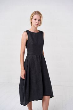 "Classy, sleeveless, fitted linen dress with irregular midi length. Classical black color is never boring, always appreciated and suits everybody! Feminine, fit and flare style of this dress has romantic vibe, yet it is sophisticated and even modest, suitable for everyday or some formal events with jacket on it. Stonewashed linen fabric gives this garment unique appearance and feel of softness, which I am sure you will highly appreciate! FABRIC: 100% Highest quality, stonewashed linen MODEL: Our Linen Kaftan Dress, Linen Kaftan, Midi Dress For Women, Linen Shirts Women, Black Linen Dress, Romantic Blouses, Linen Collection, Linen Midi Dress, Bohemian Beach