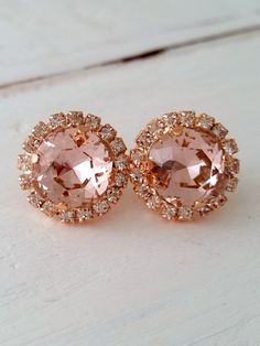 "Blush pink earring,Rose gold Blush bridal earring,Blush pink bridesmaid gift,Blush pink stud earring,Blush wedding,Swarovski crystal earring Chic+ Classic. These earrings have so much sparkle that my camara can't catch.... they are so elegant . They would be great as bridal earrings or for any other day. Perfect gift for bridesmaids or for any other occasion. They are made of Rose gold plated brass and Swarovski crystals, all set in prong setting. Made with CRYSTALLIZED™ - high quality genuine Dazzling Round Cut Earrings For Party, Elegant Crystal Bling Earrings For Gift, Pink Sparkling Round Earrings, Dazzling Bling Earrings As Gift, Glamorous Sparkling Earrings For Gift, Glamorous Sparkling Earrings As Gift, Pink Round Earrings With Sparkling Stones, Pink Sparkling Stone Round Earrings, Dazzling Pink Round Earrings