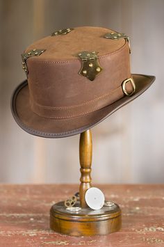 Our Steampunk headwear sports a thick Bromley shape topped with four functional metal hinges for an edgy looking hat. Steampunk Hats, Steampunk Costumes, Steampunk Top, Steampunk Top Hat, Steampunk Hat, Mini Top Hat, Leather Hat, Metal Hinges, Unique Hats