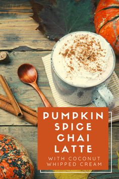 pumpkin spice chai latte with coconut whipped cream is the perfect fall drink for cold weather