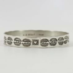 Sterling Silver Bangle Bracelet with Hand-Stamped Designs. .375” Bangle Width, 8” Inner Circumference The Bangles, Silver Bangle Bracelet, Sterling Silver Bangle Bracelets, Sterling Silver Bangle, Silver Bangle Bracelets, Sterling Silver Bangles, Silver Bangle, Silver Bangles, Bangle Bracelet