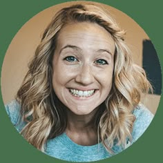 a woman with blonde hair and blue shirt smiling at the camera in a circular photo