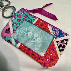 Nwt - Brand New Vera Bradley Lanyard Wallet. *Item Comes From A Smoke-Free Home. Purple Wallet With Cell Phone Pocket, Purple Rectangular Coin Purse For Everyday Use, Purple Rectangular Wallet With Cell Phone Pocket, Rectangular Purple Coin Purse For Everyday Use, Purple Pouch Wallet For Daily Use, Multicolor Rectangular Coin Purse With Key Chain Holder, Multicolor Rectangular Coin Purse With Interior Key Chain Holder, Purple Coin Purse With Card Slots For Daily Use, Casual Multicolor Rectangular Coin Purse