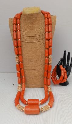 Two layers of necklace for African groom made from Edo coral beads and non tanish gold necklace with 2 bracelets. Production takes 14business days. You want a custom made pieces??? We are always here for you. Do you want it faster than the stipulated time? Please indicate when placing your order. Thanks Please feel free to start a conversation with me. Thank you Traditional Gold Beaded Necklaces With Red Coral, Luxury Traditional Red Coral Beaded Necklace, Traditional Red Coral Beads, Nigerian Beads Necklaces Coral, Traditional Multi-strand Red Coral Beaded Necklace, Coral Fashion, African Beads Necklace, African Wear Styles For Men, African Accessories