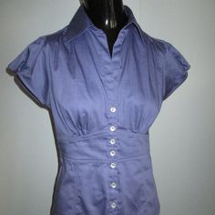 Banana Republic Cotton Spandex Purple Puff Sleeve Fitted Button Front Blouse. Fitted V-neck Blouse With Buttons, Short Sleeve Stretch Blouse With Buttons, Stretch Short Sleeve Blouse With Buttons, Stretch Short Sleeve Blouse With Button Closure, Stretch Office Blouse With Buttons, Purple Fitted Button-up Blouse, Stretch Collared Blouse With Buttons, Fitted Short Sleeve Blouse With Buttons, Fitted Collared Blouse With Buttons