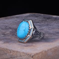 Turquoise Stone Ring, Turkish Men's Ring, 925 Sterling Silver Ring, Turkish Handmade Ring, Mens Jewelry, Gift for men, Fathers day gift ABOUT PRODUCT  *   Material is 925K Sterling Silver and bronze  *   The stone is turquoise   *   Dimensions top of the ring: 15 mm * 20 mm  *   This product weight is 13.50 grams SHIPPING POLICY  We have economy and express shipping.  If you want, you can upgrade to express shipping. Delivery times: 3-12 business days > economy shipping 2-5 business days > express shipping RETURN POLICY  You can return the product within 30 days. ( after receiving ) For custom made products, return is not accepted. CUSTOMER SATISFACTION POLICY Your satisfaction is our priority. We guarantee you our products quality exceed its real value. All your questions will be answered Turquoise Stone Ring, Islamic Jewelry, Designer Silver Jewellery, Vintage Silver Jewelry, Ring Mens, Islamic Gifts, Mens Silver Rings, Silver Rings Handmade, Men's Ring