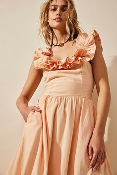 Effortlessly ethereal, this sweet midi from our free-est collection is the perfect romantic look. **Fit:** A-line silhouette with slim fit bodice **Features:** Exaggerated ruffled square neckline, billowy skirt design, tie-back closure **Why We | Ruffle It Up Midi Dress by free-est at Free People in Pink, Size: L Feminine Bridesmaid Midi Dress With Ruffles, Bridesmaid Midi Dress With Sweetheart Neckline And Ruffles, Feminine Bridesmaid Dresses With Ruffled Straps, Chic Midi Dress With Ruffled Straps For Daywear, Spring Bridesmaid Midi Dress With Ruffle Hem, Summer Midi Dress With Ruffle Hem And Sweetheart Neckline, Flirty A-line Midi Dress With Ruffles, Flirty Midi Dress With Sweetheart Neckline For Brunch, Flirty Midi Dress With Fitted Bodice