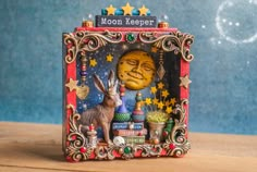 a small box with an image of the moon and rabbit