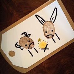 a paper cutting board with two rabbits on it