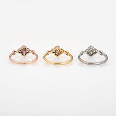 Pre owned set of 3 Cartier Hindu diamond rings crafted in 18 karat white, rose and yellow gold.    Twelve round brilliant cut diamonds (4 per ring) total an estimated 0.36 carats (estimated at F-G colour and VVS2 clarity).  The out of production Cartier rings feature a floral motif. Quite a rare find as a set of 3, the rings are typically found as a single ring. The rings are petite in scale and are great worn alone or layered with your fine jewellery from any era. Makes a fun stack on the pinky Flower Band, Single Ring, Ring Crafts, Gold Flower, Cartier Ring, Fine Jewellery, Gold Flowers, Round Brilliant Cut Diamond, White Rose