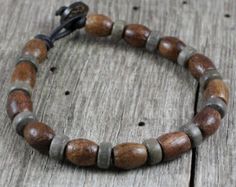 Mens Mala Bracelet Leather Wood Beaded by SolCreationsJewelry Rustic Wooden Beads Bracelet, Rustic Brown Beaded Bracelets With Wooden Beads, Rustic Brown Wooden Beaded Bracelets, Mens Mala Bracelet, Mens Bracelet Designs, Leather Cord Bracelets, Surfer Bracelets, Beaded Jewelry Necklaces, Bracelet Leather