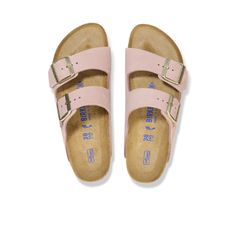 Birkenstock Women's Arizona Soft Footbed Nubuck Leather Pink 1027651 An icon of timeless design and legendary comfort, the Arizona sandal has been defining style since 1973. Featuring an additional foam layer for cushioning, the soft footbed offers extra comfort plus go-all-day support. The adjustable two-strap look comes in classic, velvety suede to make it a match for any season and every style. These provide comfort for people who suffer from bunions, plantar fasciitis, metatarsalgia, heel sp 17th Birthday Wishes, Feet Shoes, Birkenstock Women, 17th Birthday, Leather Slide Sandals, Leather Slides, Nubuck Leather, Slide Sandals, Birthday Wishes