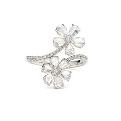 For Sale on 1stDibs - 0.96 Carats of Diamond Rosecut and Round set in Ring made in 18k White Gold Delicate yet bold, this 18k white gold by-pass ring is charming and unique. Luxury Vintage Flower Ring With Rose Cut Diamonds, Rose Cut Diamond Earrings, Luxury White Gold Diamond Ring With Flower Shape, Luxury White Gold Flower Shaped Diamond Ring, Luxury White Flower-shaped Diamond Ring, White Diamond Flower Ring With Diamond Cut, Luxury White Gold Flower Ring For Wedding, White Flower-shaped Diamond Ring, White Diamond Flower Ring Fine Jewelry