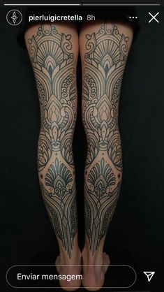 the legs are covered with tattoos on them