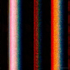 an image of multicolored lines in the dark