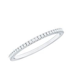 a white gold wedding band with diamonds on the sides and a curved design in the middle