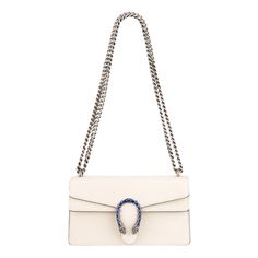 The Dionysus Shoulder Bag Is Presented In White Textured Leather With The Now Defining Tiger Head Closurea Unique Detail Referencing The Greek God Dionysus. The Closure Is Further Enhanced With Crystals. The Sliding Chain Strap Can Be Worn Multiple Ways, Changing Between A Shoulder And A Top Handle Bag. White Leather Silver-Toned Hardware Crystal Details At The Closure Cotton Linen Lining Pin Closure With Side Release Hand-Painted Edges Tiger Head Closure Interior Zipped Compartment Pocket Under White Gucci Shoulder Bag With Chain Strap, White Gucci Shoulder Bag For Evening, Gucci Cream Shoulder Bag For Evening, Elegant Cream Gucci Shoulder Bag, White Gucci Bag For Everyday Luxury, Luxury Gucci Cream Shoulder Bag, Luxury Cream Gucci Shoulder Bag, Luxury Gucci Cream Bag, Luxury Cream Gucci Bag