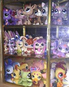 there are many little pony toys on the shelves