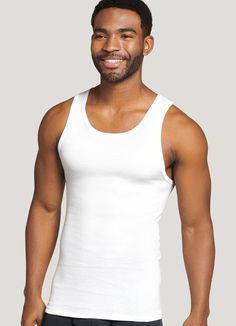 Essential under sweaters, flannels and dress shirts, the legendary Jockey® 100% Cotton Big Man A-Shirt Tank just got even better, now with 100% combed cotton for lasting softness and good looks. The comfy rib knit is enhanced with StayNew technology to reduce pilling and fading so it looks and feels new, whiter and brighter, wash after wash. | Jockey® 100% Cotton Big Man A-Shirt Tank - 3 Pack in White Classic Tank Top For Layering, White Classic Crew Neck Tank Top, Classic Cotton Shirt For Loungewear, Classic Solid Color Crew Neck Tank Top, Classic White Cotton Tank Top, Classic Cotton Tank Top For Daywear, Jockey Mens, Big Men, Keep Your Cool