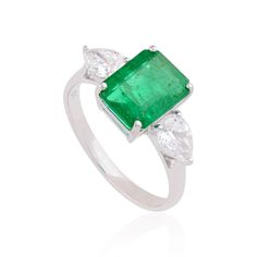 100% Genuine Zambia Emerald Gem / Prong set Ring / 18k White Gold Emerald Cocktail Ring / Diamond Wedding Rings / Engagement Ring Jewelry Details :- Item Code:- SER-2199D Gross Weight :- 3.39 gm 18k White Gold Weight :- 2.76 gm Diamond Weight :- 0.80 ct. Emerald Weight: 2.35 ct. Ring Size: 7 us and we can make ring size as per your requirement size. ≫ FAQ below for more detail. ✦ Sizing We can adjust most items to fit your sizing preferences. Most items can be made to any size and length. Please Luxury Solitaire Emerald Ring For Formal Occasions, Elegant Emerald Solitaire Ring With Baguette Cut, Elegant Green Diamond Ring With Brilliant Cut, Elegant Baguette Cut Diamond Birthstone Ring, Elegant Emerald-cut Solitaire Ruby Ring, Elegant Open Ruby Ring, Elegant Gia Certified Pear-shaped Diamond Ring, Elegant Green Birthstone Ring For Formal Occasions, Elegant Cubic Zirconia Emerald Ring With Baguette Cut