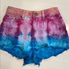 Bdg Urban Outfitters High-Rise Cheeky Distressed Shorts. Size 24 Tie-Dyed Which Is So On Trend Right Now! Urban Outfitters Bottoms With Built-in Shorts, Urban Outfitters Blue High-waisted Shorts, Urban Outfitters High-waisted Jean Shorts For Summer, Pink Ladies Outfit, Urban Outfitters Shorts With Built-in Shorts, Urban Outfitters High-rise Cotton Jean Shorts, Urban Outfitters Shorts, Distressed Shorts, Tie Dyed