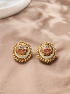 Unveil the elegance with our Polki earrings, a testament to timeless style and craftsmanship. Crafted from 22kt gold-plated brass, these earrings add a touch of sophistication to any ensemble. Finish: 22KT Gold Plating Material: Brass, Polkis Color: Gold Size: One Size Closure Type: Push Lock Box Contains: 1 Pair of Earrings Polki Studs, Hand Jewelry Rings, Chain Braid, Artificial Jewelry, Polki Earrings, Jewelry Indian, Hand Jewelry, Anklet Jewelry, Charm Gift