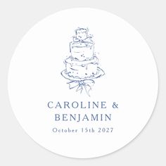 a wedding cake sticker with the words, name and date in blue ink on it