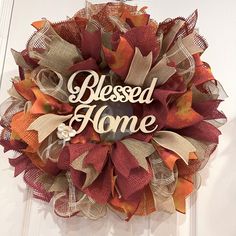 a wreath with the words, blessed home on it