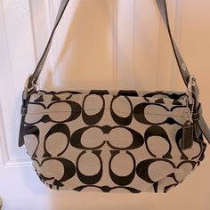 Coach Purse (Nwot) Black And Grey Signature Bag With Shoulder Strap. Please Reach Out With Any Questions. This Bag Is New And Never Been Used. Closet Clean Out Time! Coach Gray Bag With Silver-tone Hardware, Coach Bags With Silver-tone Hardware In Gray, Casual Coach Shoulder Bag With Silver-tone Hardware, Chic Coach Gray Shoulder Bag, Chic Gray Coach Shoulder Bag, Coach Gray Shoulder Bag With Silver-tone Hardware, Coach Gray Tote Shoulder Bag, Coach Gray Shoulder Bag, Gray Coach Shoulder Bag