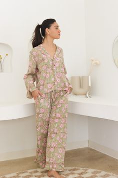 Introducing the Day Naps - Hannah Pajama Set, which can be worn both during the day and overnight. This set displays a hand block print in hues of beige and pink, featuring pink piping details as well as ruffles at the sleeve and hem. An elastic waistband ensures a snug, comfortable fit while the front closure is secured with buttons. Pockets. Machine wash ok. Bamboo Pajamas, Floral Pajamas, Eco Friendly Clothing, Bamboo Fabric, Long Sleeve Pyjamas, Comfy Fits, Sleepwear Women, Recycled Fabric, Pajama Set