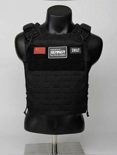 the swat body armor is displayed on a mannequin