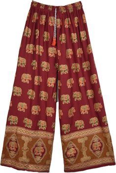 A super trendy bohemian pair of pants in rosewood red with golden ethnic elephant print all over.  This pair of party wear pants will ensure that you are the center of attention at any party. #tlb #SplitSkirtsPants #beachwrap #Elephant #bohemianfashion #WideLegPants #BeachPants #elephantpants #coolsummerpants Festival Ankle-length Pants, Ankle-length Pants For Festivals, Festive Ankle-length Bottoms For Festivals, Festive Wide Leg Bottoms For Festivals, Bohemian Festive Harem Bottoms, Bohemian Wide Leg Festive Bottoms, Festive Bohemian Wide Leg Bottoms, Bohemian Wide Leg Bottoms For Festive Occasions, Festive Red Bottoms For Festivals