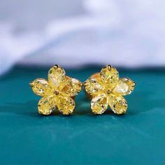 Delicate and Sophisticated fancy yellow diamond studs earrings in 18K Gold. Yellow diamonds are quickly becoming favoured alternatives to colourless gemstones and always look stunning Will be an excellent gift for holidays, birthday or just something special as a present Details: Main Stone: Genuine Yellow Diamonds 0.70 ctw Diameter: 7 mm Metal: 18K Solid Gold CUSTOM ORDER: This earrings is offered in different metal color. Lead Time 10-20 days Please, contact us for further information. Wedding Yellow Diamond Earrings With Accents, Elegant Yellow Earrings With Diamond Accents, Yellow Diamond Earrings With Gemstone, Fine Jewelry Yellow Earrings With Diamond Accents, Yellow Diamond Earrings, Diamond Studs Earrings, Diamond Flower Earrings, Elegant Yellow Diamond-cut Earrings, Yellow Diamond Earring