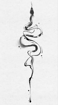 a black and white photo of a snake with its tail curled up in the air